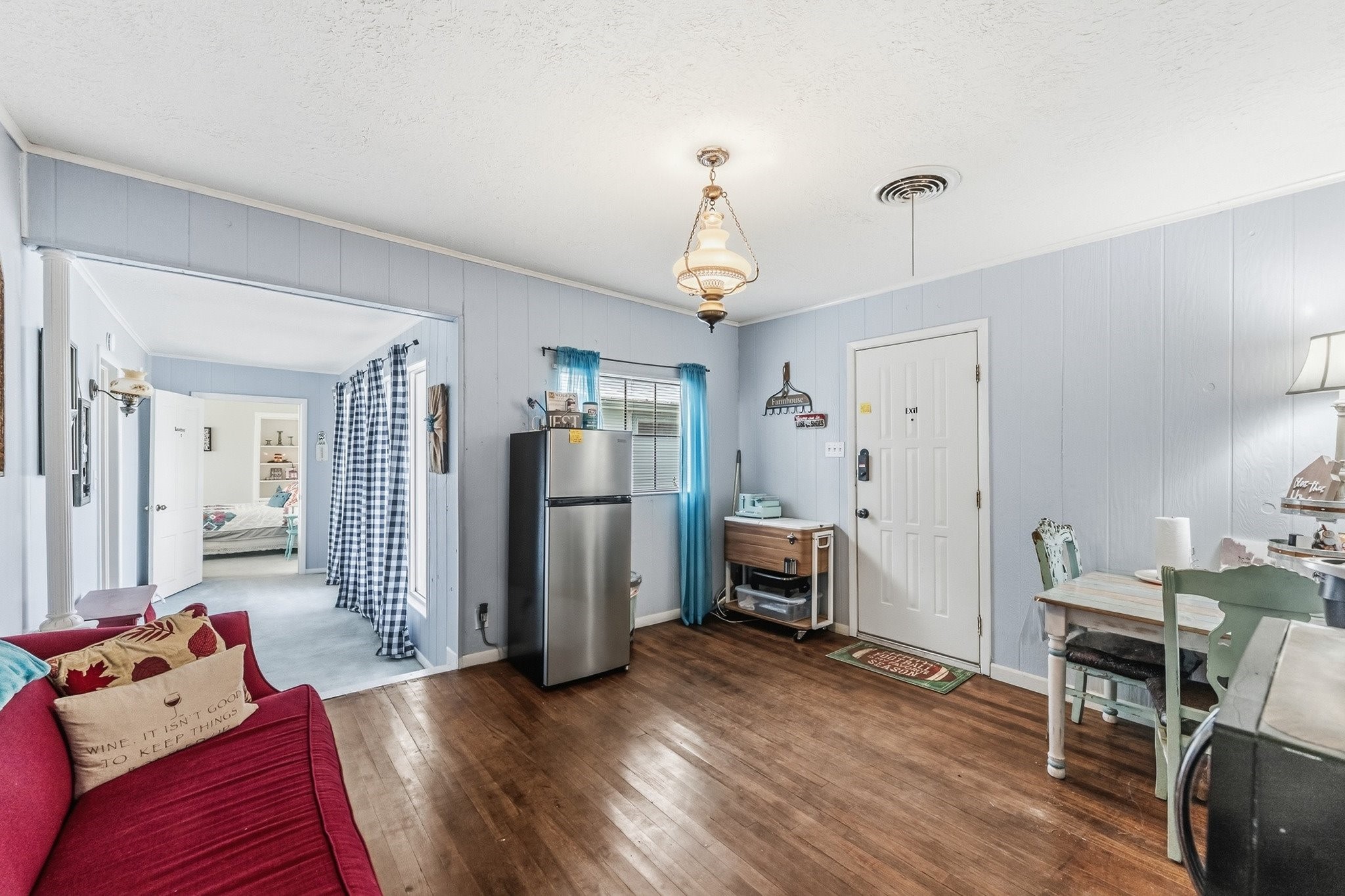 9523 West Fm 1644 Calvert, TX 77837 - Photo 13 of 22 a living room with furniture and a chandelier