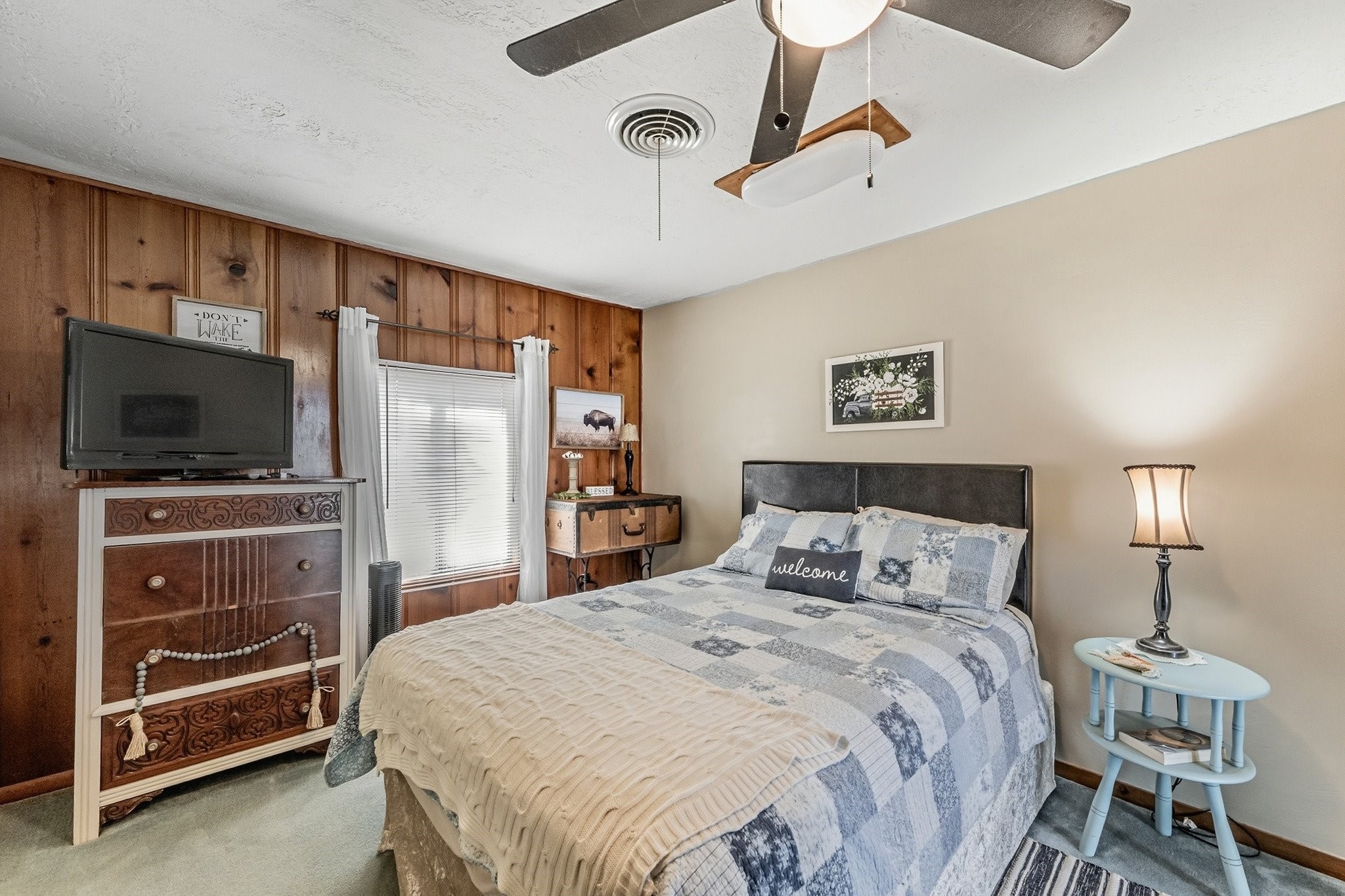 9523 West Fm 1644 Calvert, TX 77837 - Photo 14 of 22 a bedroom with a bed and a flat tv screen on wall