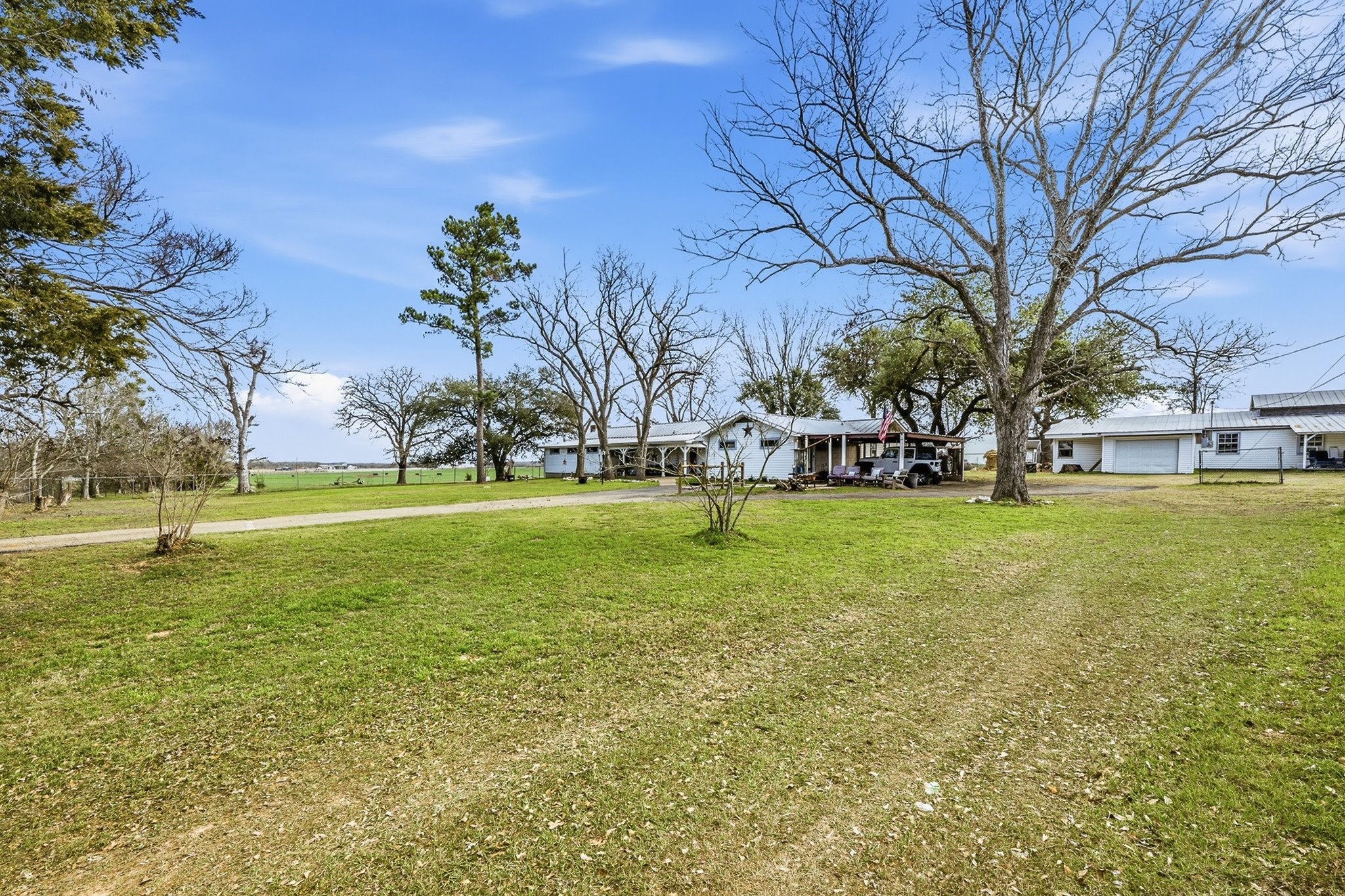9523 West Fm 1644 Calvert, TX 77837 - Photo 2 of 22 a huge green field with lots of trees