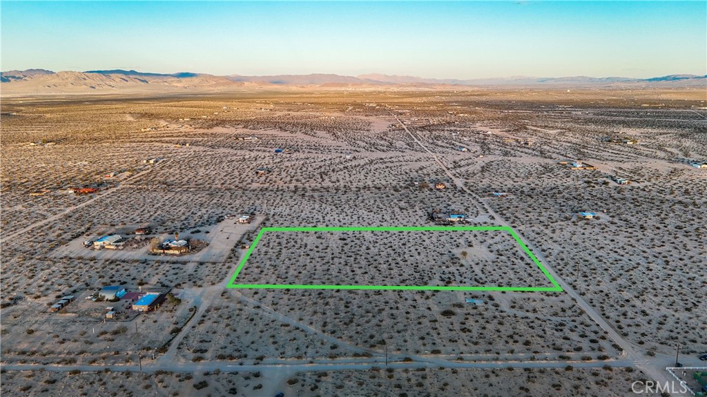 65370 Brant Crossing Road Joshua Tree, CA 92252 - Photo 3 of 40 a view of a city with ocean view