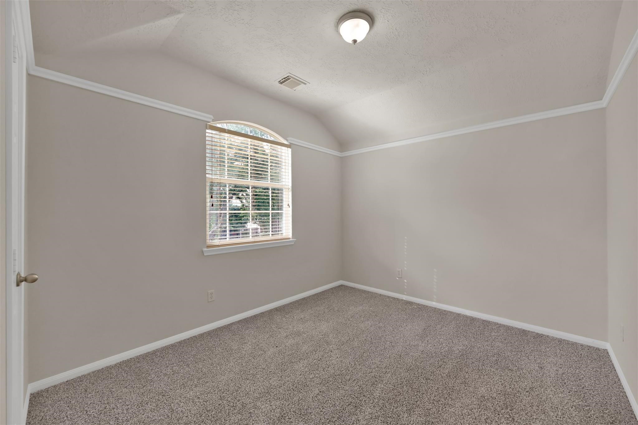 1443 Meadowhigh Lane Spring, TX 77373 - Photo 14 of 23 an empty room with a empty space and windows