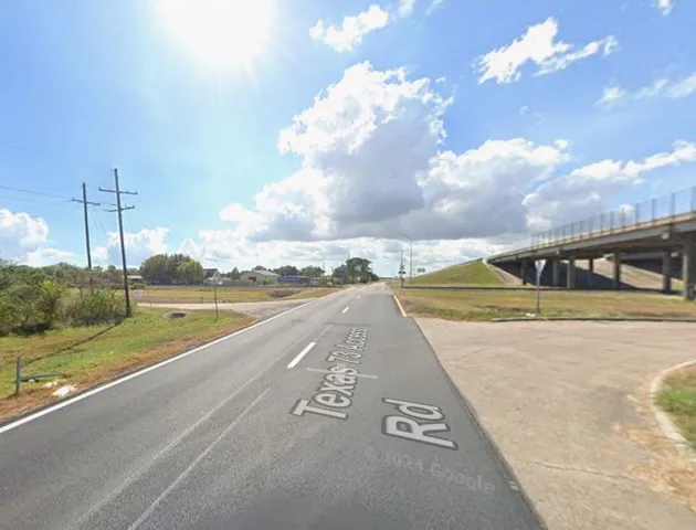 a view of swimming pool with a yard