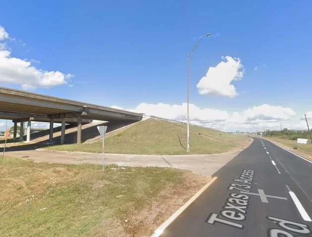 a view of a swimming pool with a yard