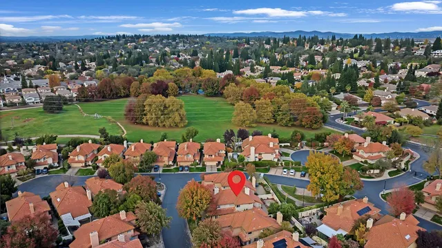a view of a city and mountains ocean view