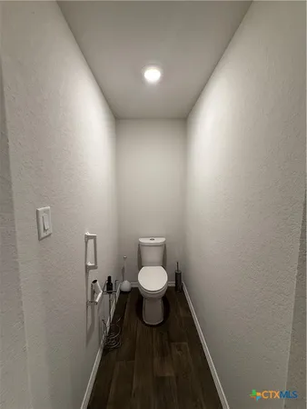 a bathroom with a toilet