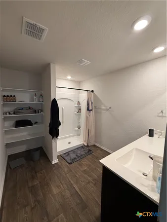 a view of a kitchen with electric appliances