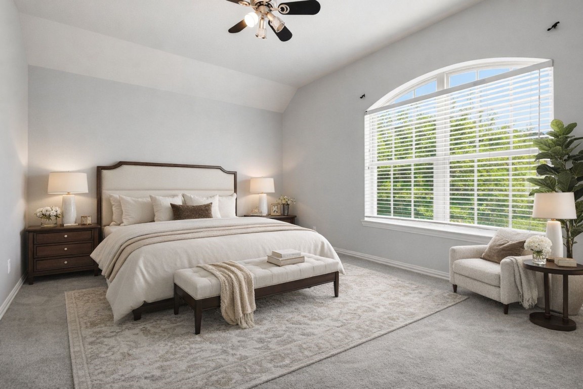7 Maple Mill Court Conroe, TX 77301 - Photo 9 of 20 a bedroom with a bed and a couch