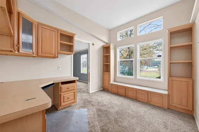 a room with furniture and a fireplace