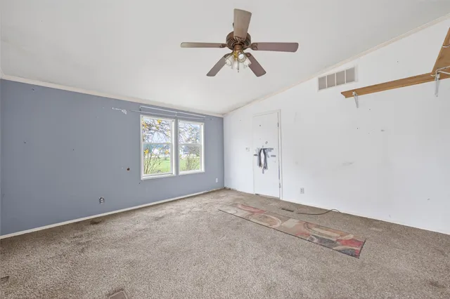 a bathroom with a sink mirror and a bathtub