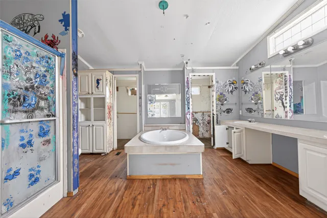 a view of a living room and bathroom