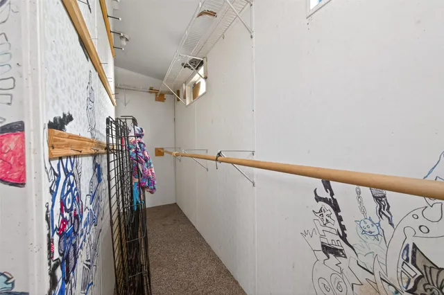 a kitchen with stainless steel appliances granite countertop a refrigerator and a stove