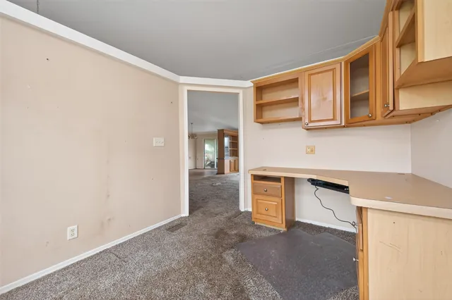 a view of a yard with a tree