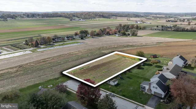 a view of a lake with a mountain and trees