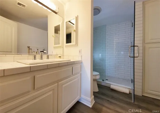 a view of swimming pool from a balcony