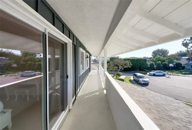 a view of a backyard with plants and a garden
