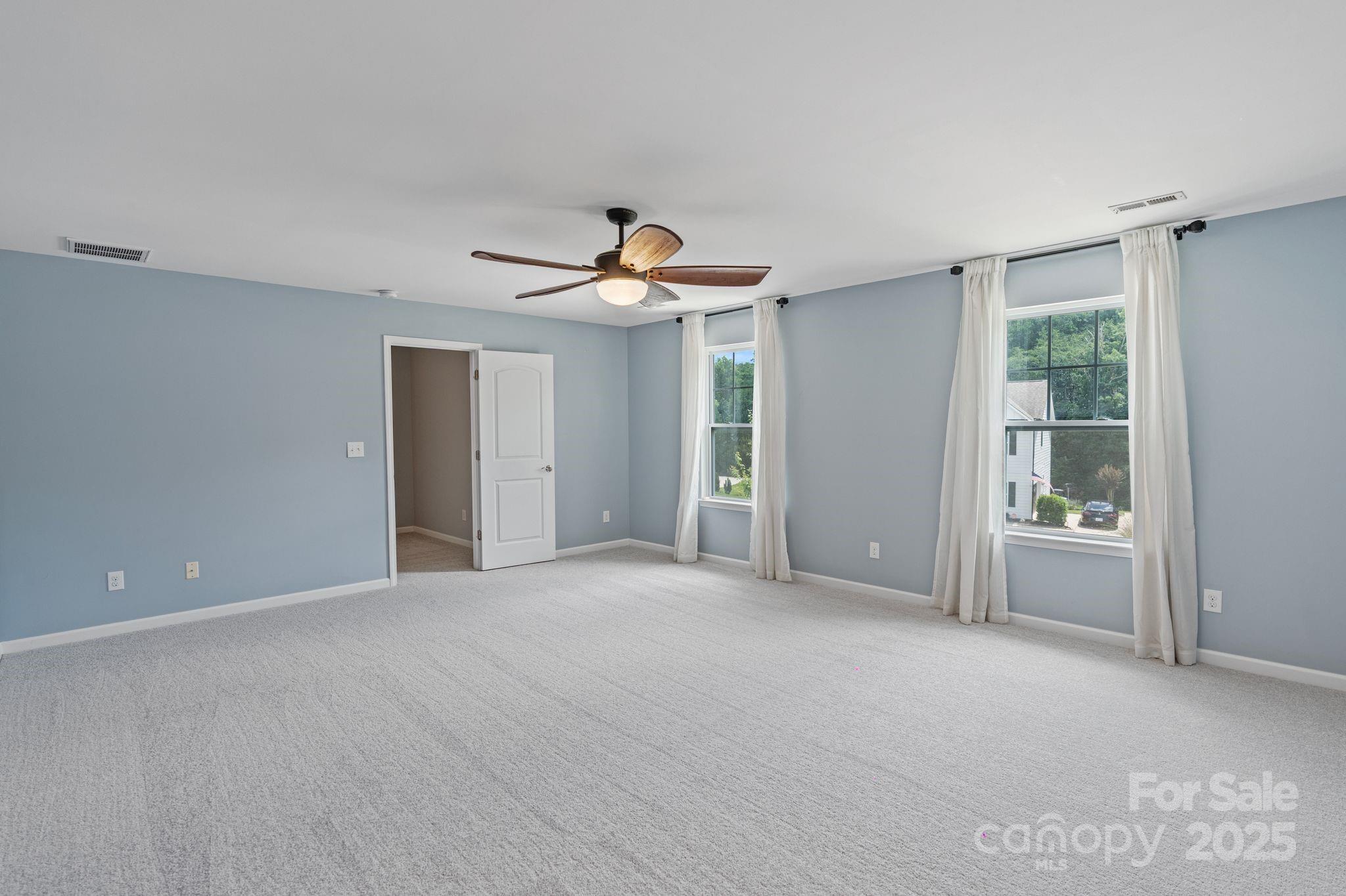 7129 Dove Field Lane Fort Mill, SC 29707 - Photo 20 of 27 a view of an empty room with a window
