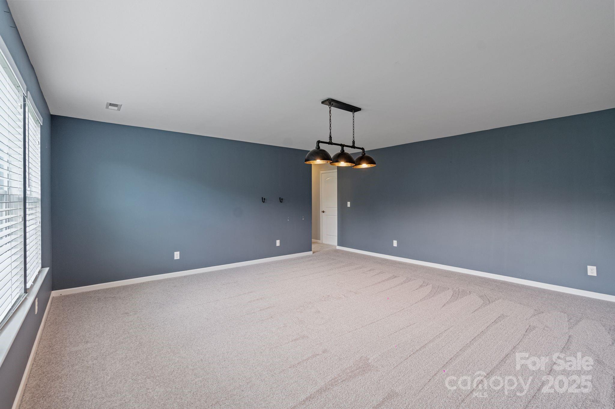 7129 Dove Field Lane Fort Mill, SC 29707 - Photo 27 of 27 a view of an empty room with a window