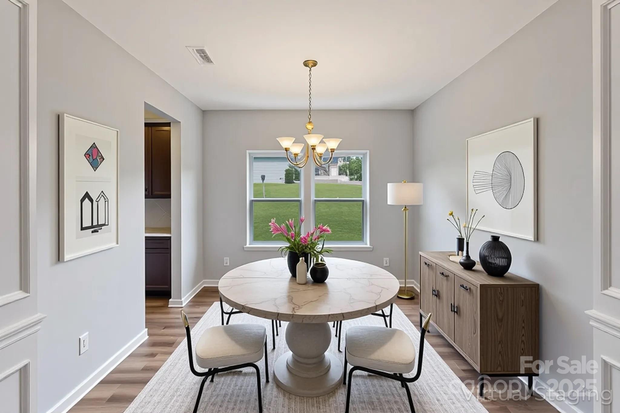 7129 Dove Field Lane Fort Mill, SC 29707 - Photo 6 of 27 a dining room with furniture and window