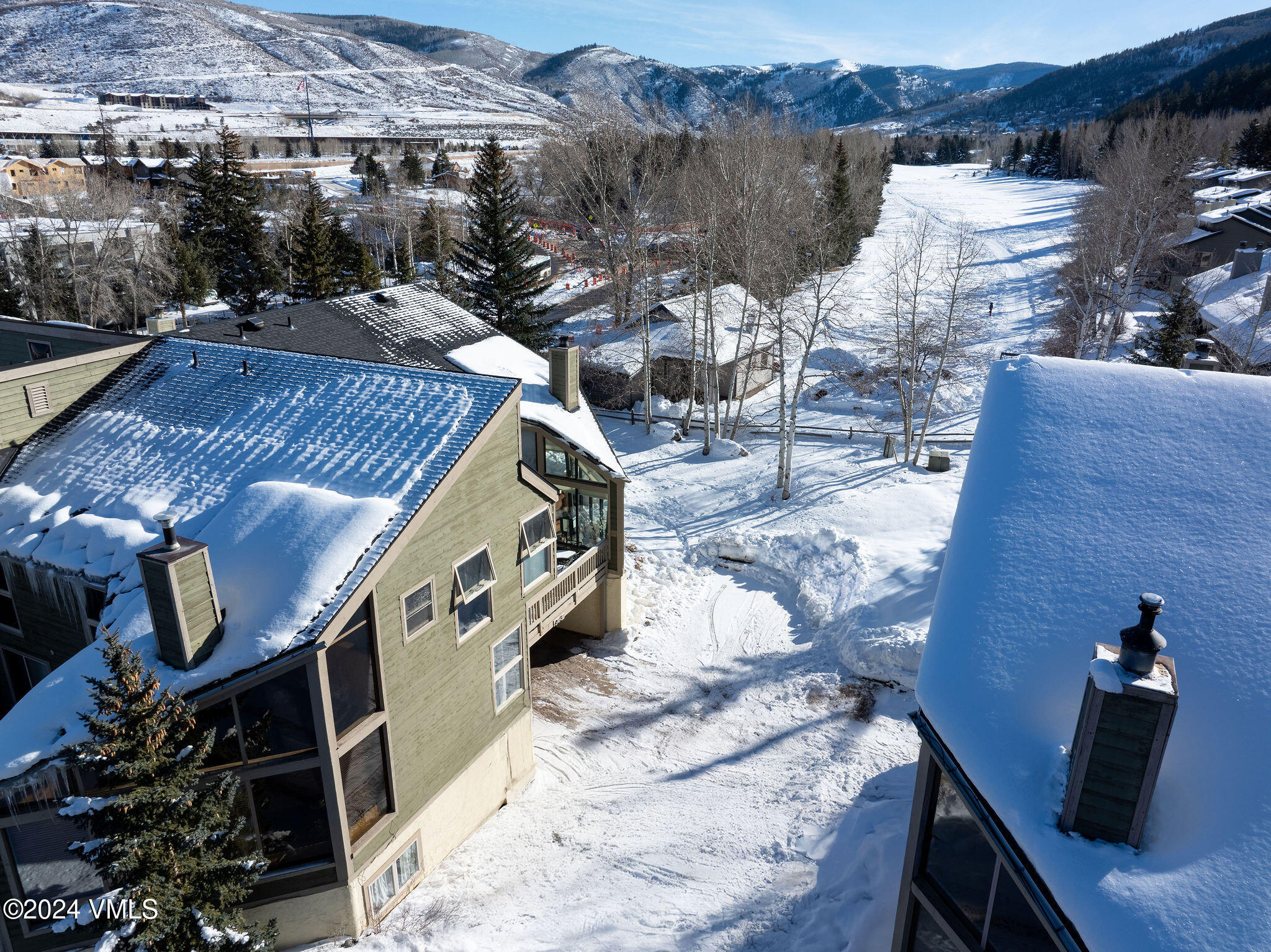 16 Eagle-Vail Road, Unit A3 Eagle-Vail, CO 81620 - Photo 19 of 24 a view of a backyard with sitting area