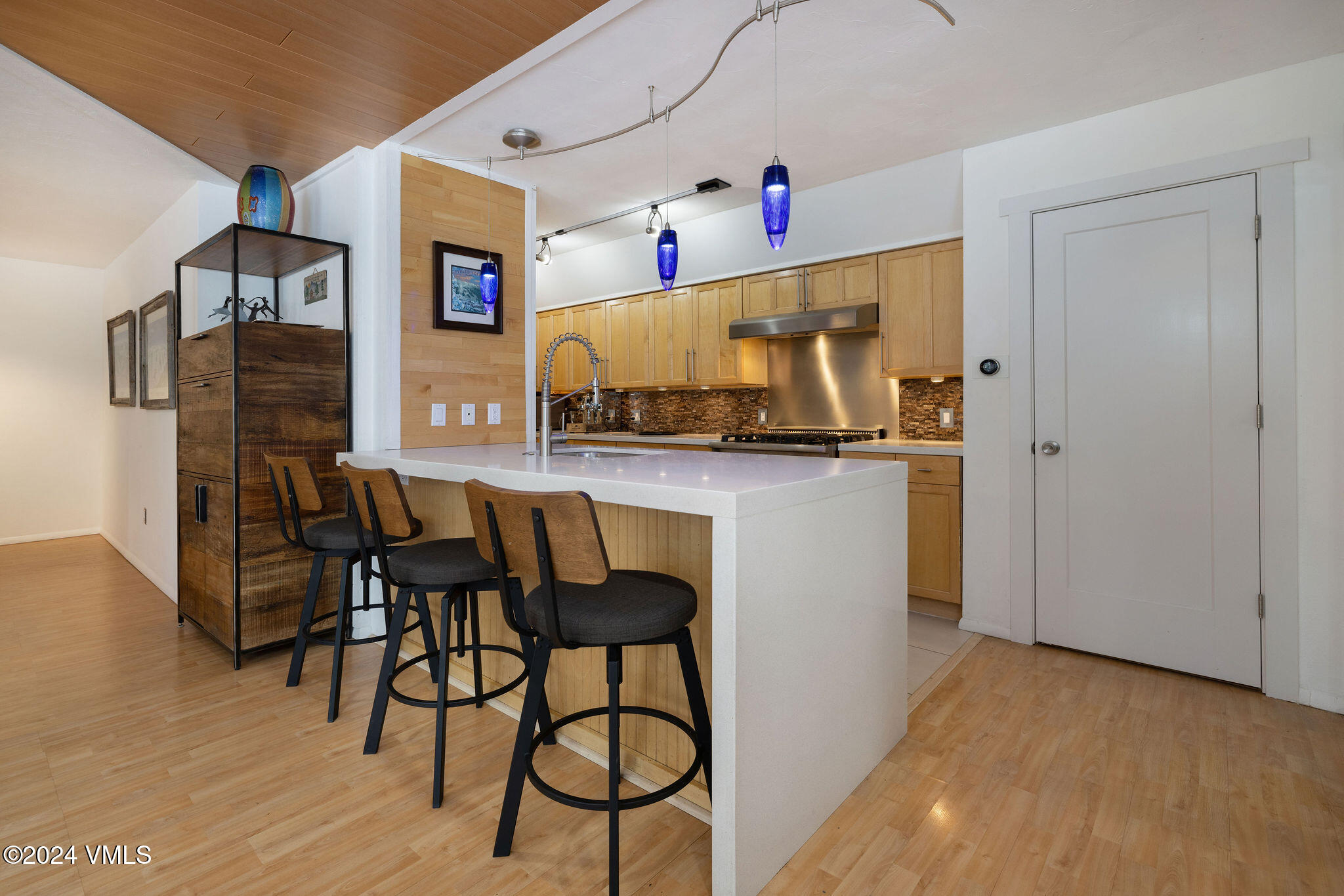 16 Eagle-Vail Road, Unit A3 Eagle-Vail, CO 81620 - Photo 4 of 24 a view of a dining room with furniture and wooden floor