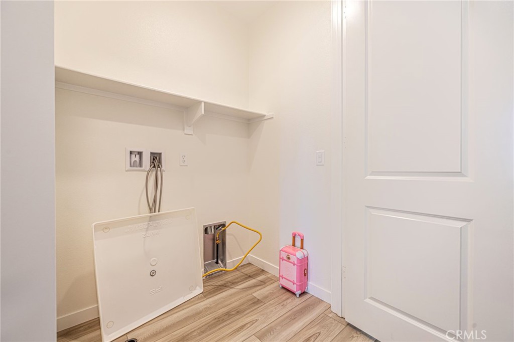 27555 Sanctuary Court Stevenson Ranch, CA 91381 - Photo 19 of 22 a view of empty room with wooden floor