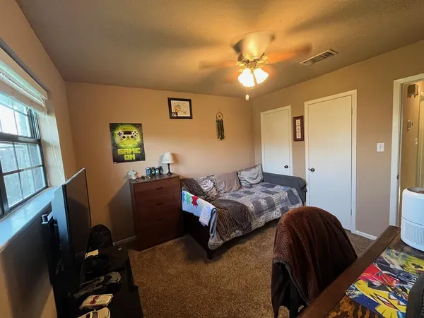 a workspace with furniture and a window