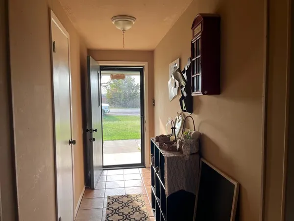 a view of a hallway with workspace