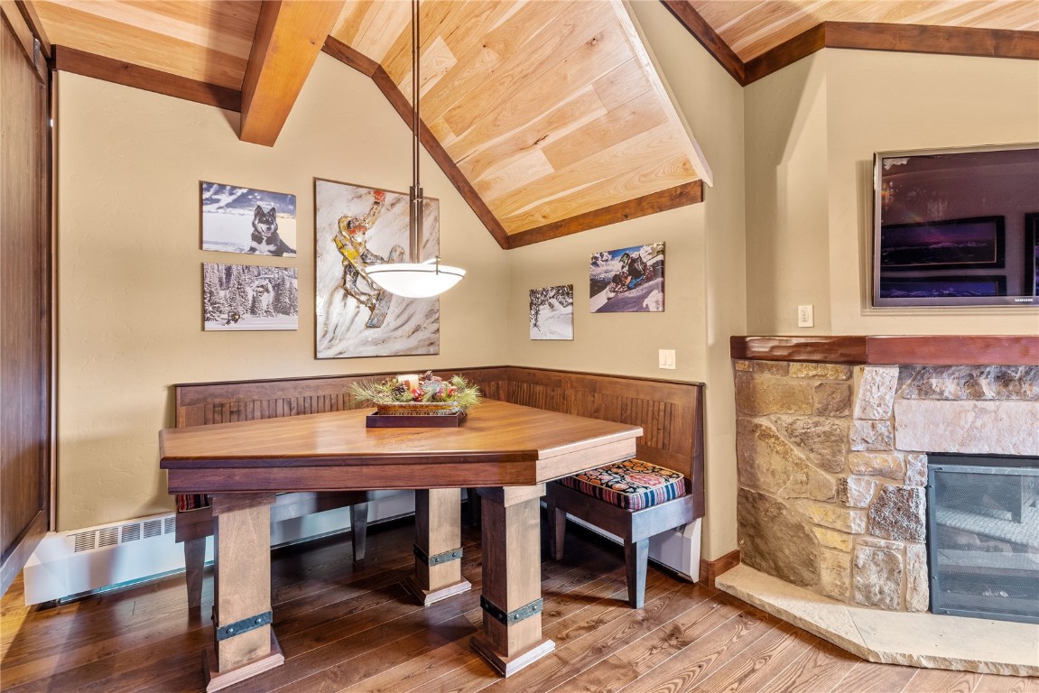 600 Columbine Road, Unit 5407 Breckenridge, CO 80424 - Photo 11 of 29 a view of a dining room with furniture and wooden floor