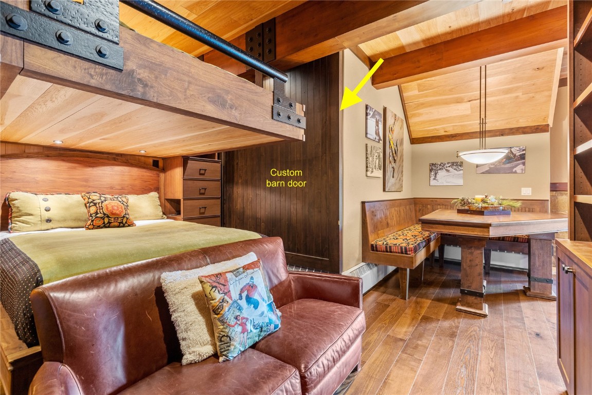 600 Columbine Road, Unit 5407 Breckenridge, CO 80424 - Photo 19 of 29 a bedroom with a bed and a table