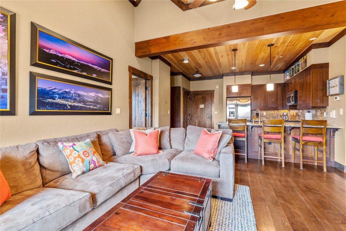 600 Columbine Road, Unit 5407 Breckenridge, CO 80424 - Photo 5 of 29 a living room with furniture and wooden floor