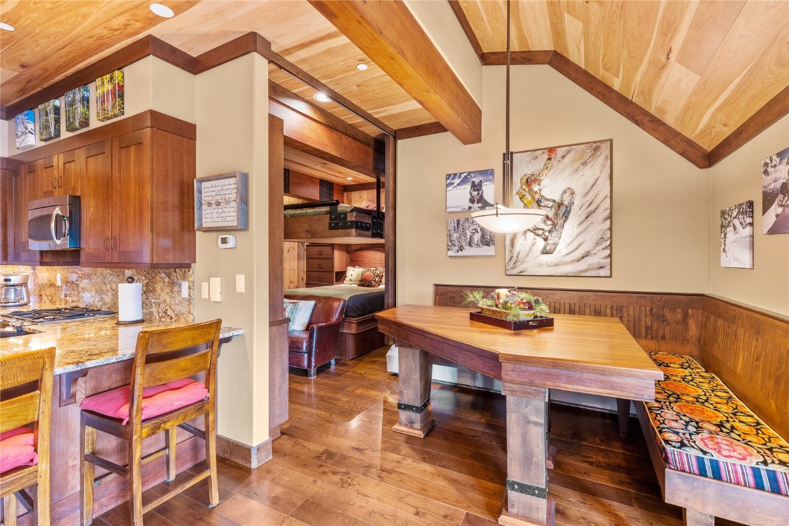 600 Columbine Road, Unit 5407 Breckenridge, CO 80424 - Photo 10 of 29 a backyard of a house with barbeque oven table and chairs