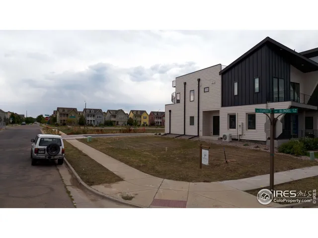 a swimming pool with outdoor seating