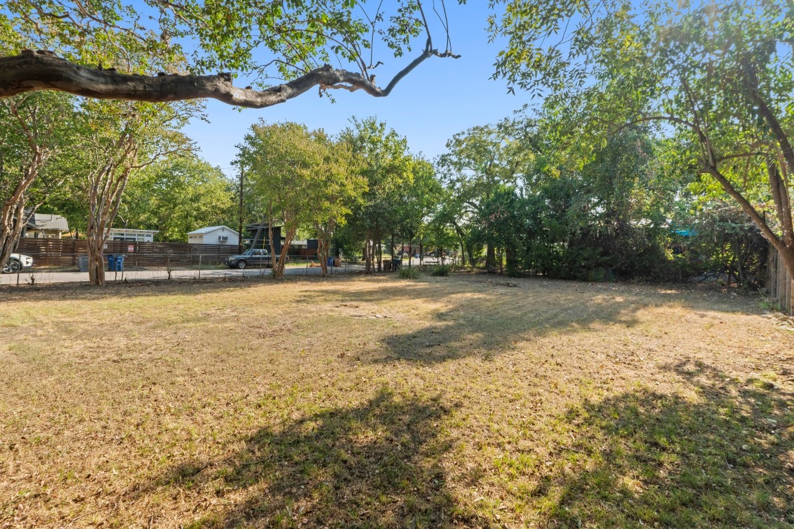 1147 Gunter Street Austin, TX 78721 - Photo 15 of 25 a view of a yard with a tree