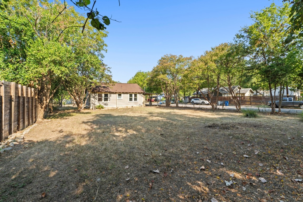 1147 Gunter Street Austin, TX 78721 - Photo 16 of 25 a view of road with yard and trees