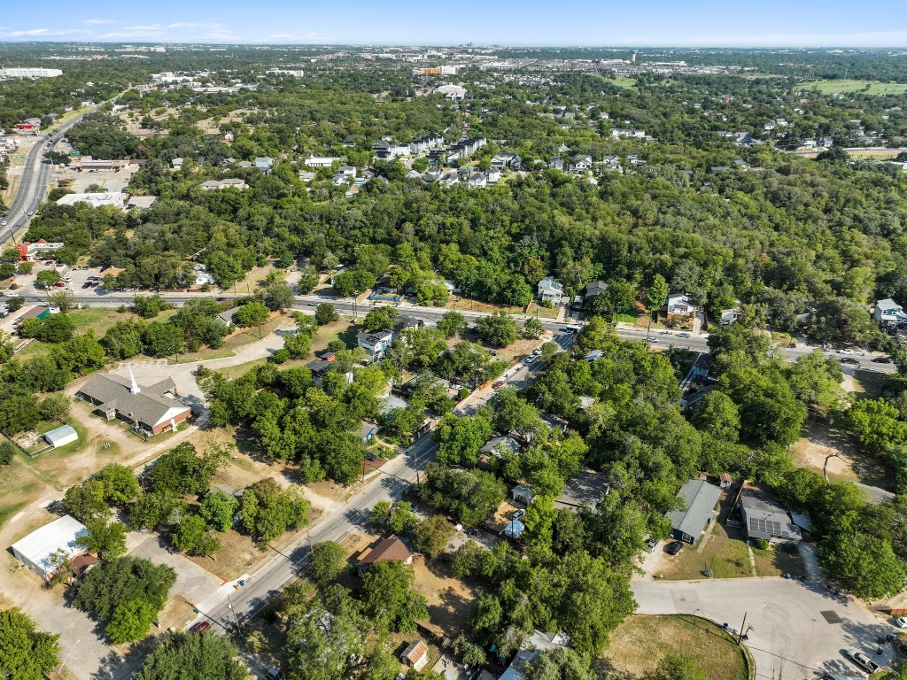 1147 Gunter Street Austin, TX 78721 - Photo 20 of 25 an aerial view of residential houses with outdoor space and trees