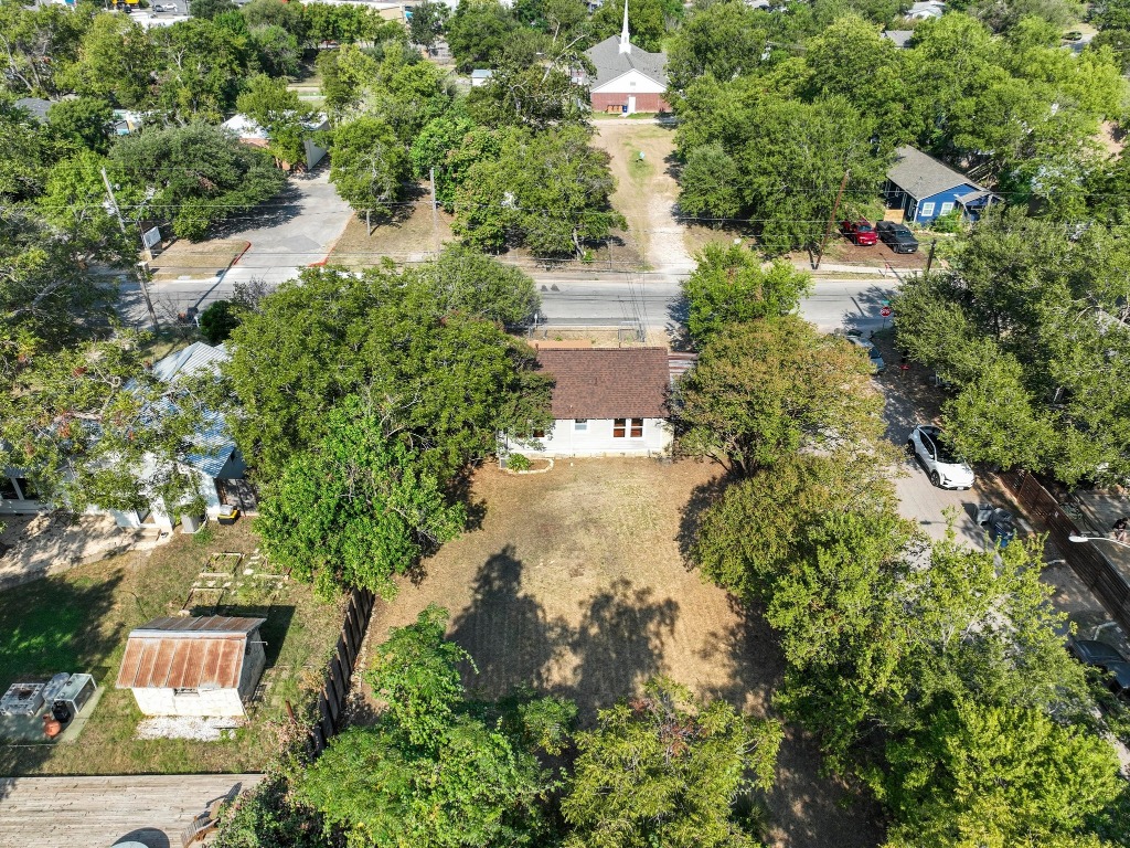 1147 Gunter Street Austin, TX 78721 - Photo 25 of 25 an aerial view of residential house with outdoor space and trees all around