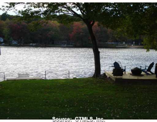 a view of a lake with a yard