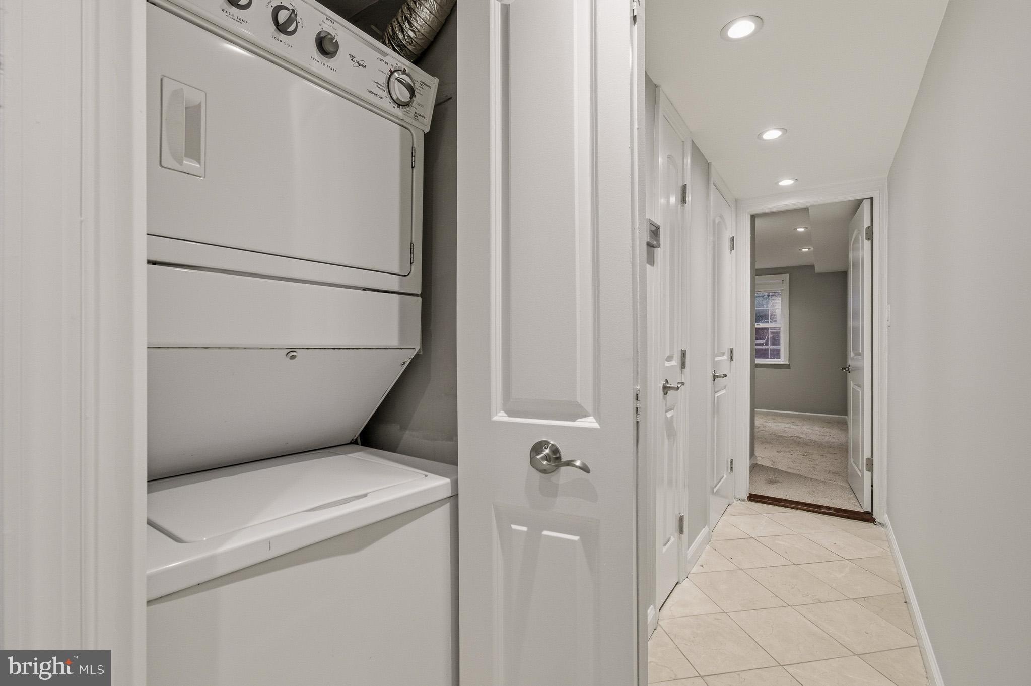 2117 S Street Northwest Washington, DC 20008 - Photo 62 of 63 a utility room with dryer and washer