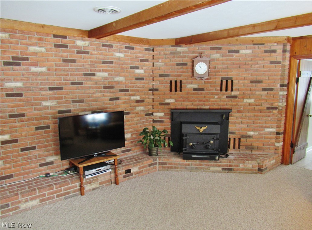 4170 Hamilton Road Medina, OH 44256 - Photo 12 of 32 Family room with brick hearth wall
