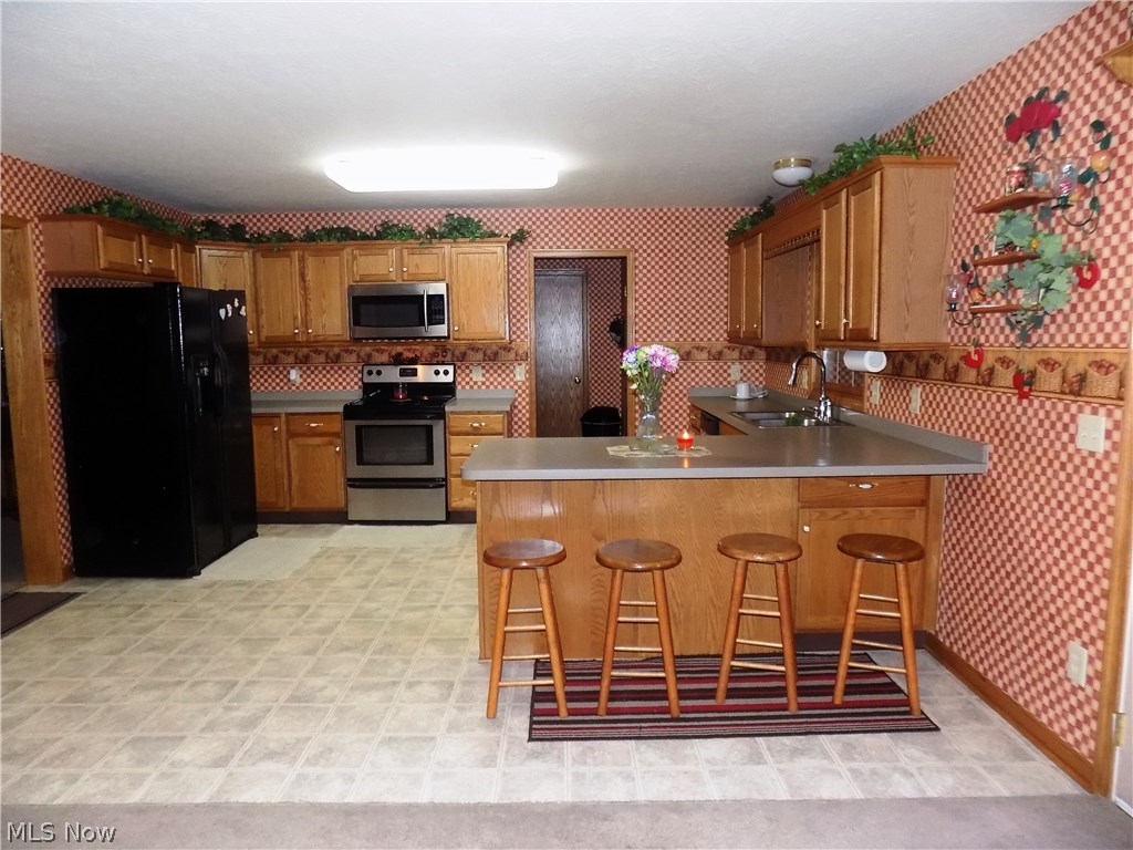 2120 Lynn Road Kent, OH 44240 - Photo 24 of 25 Open floor plan kitchen with eat in breakfast bar.