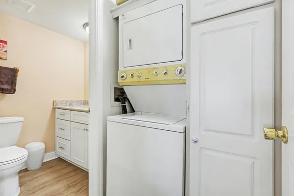 a bathroom with a toilet and a vanity