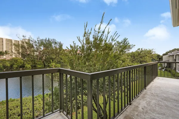 a view of a balcony with an outdoor space