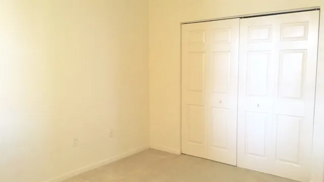 a view of a street from a balcony