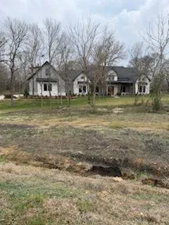 a front view of house with yard
