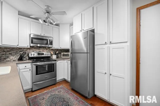 a en suite bathroom with a large tub and shower