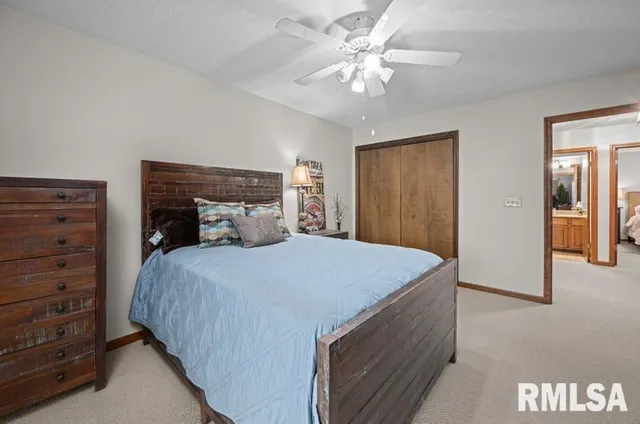 a view of a balcony with wooden chairs