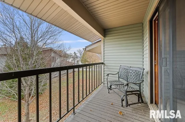 a bathroom with a double vanity sink mirror and shower