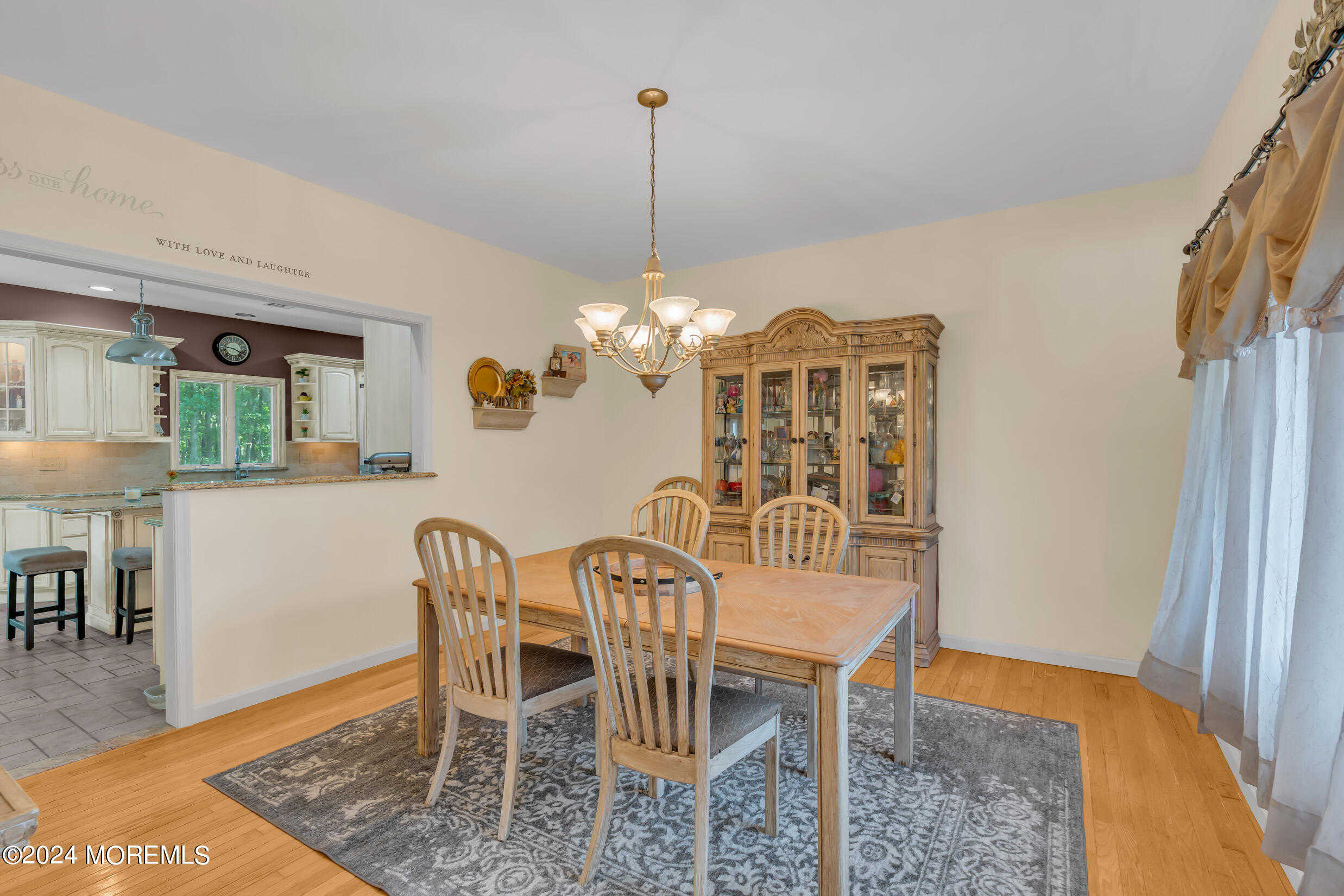 24 Ryjac Court Brick, NJ 08724 - Photo 11 of 57 a view of a dining room with furniture and wooden floor