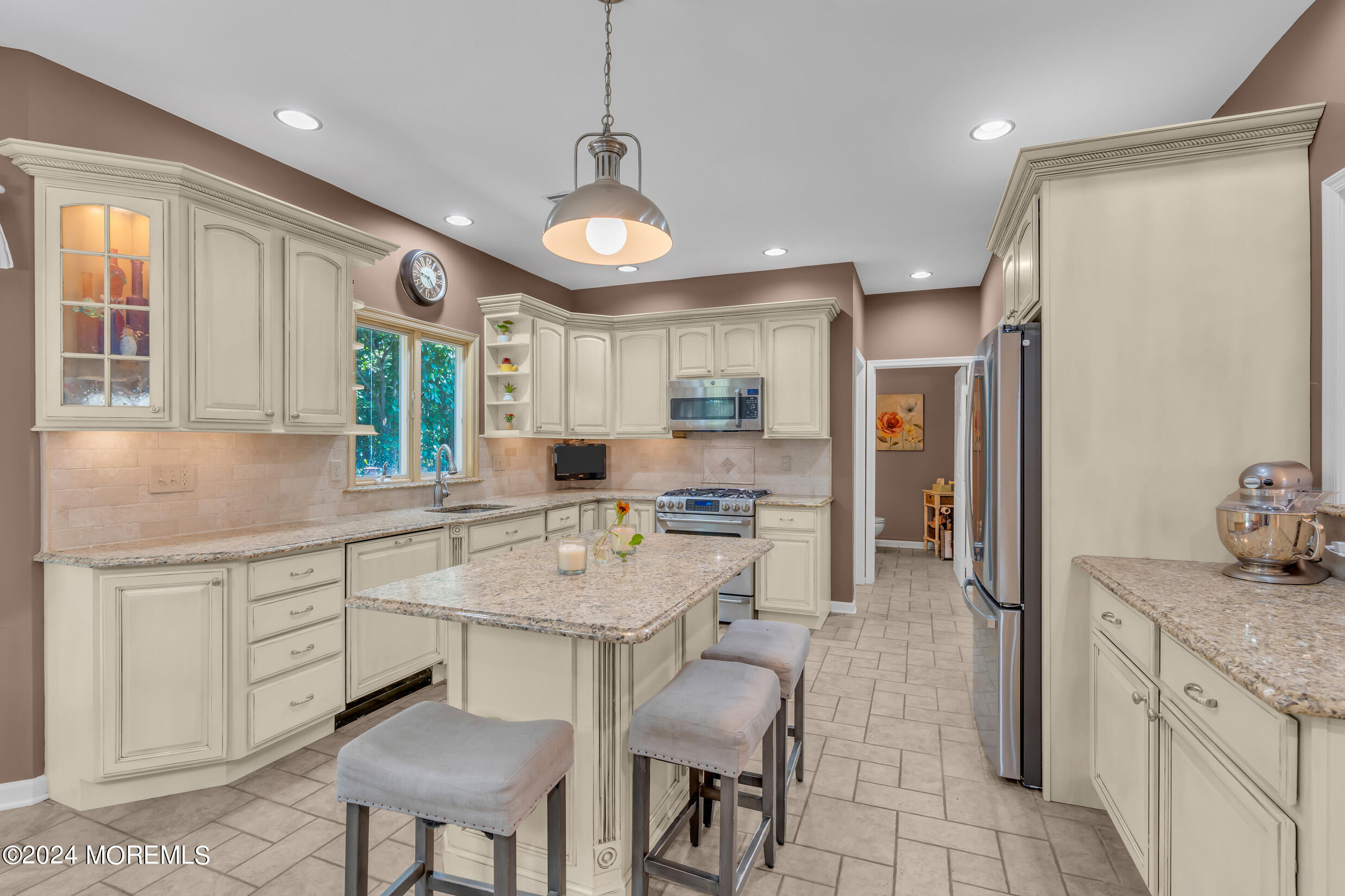 24 Ryjac Court Brick, NJ 08724 - Photo 17 of 57 a large kitchen with a table and chairs in it
