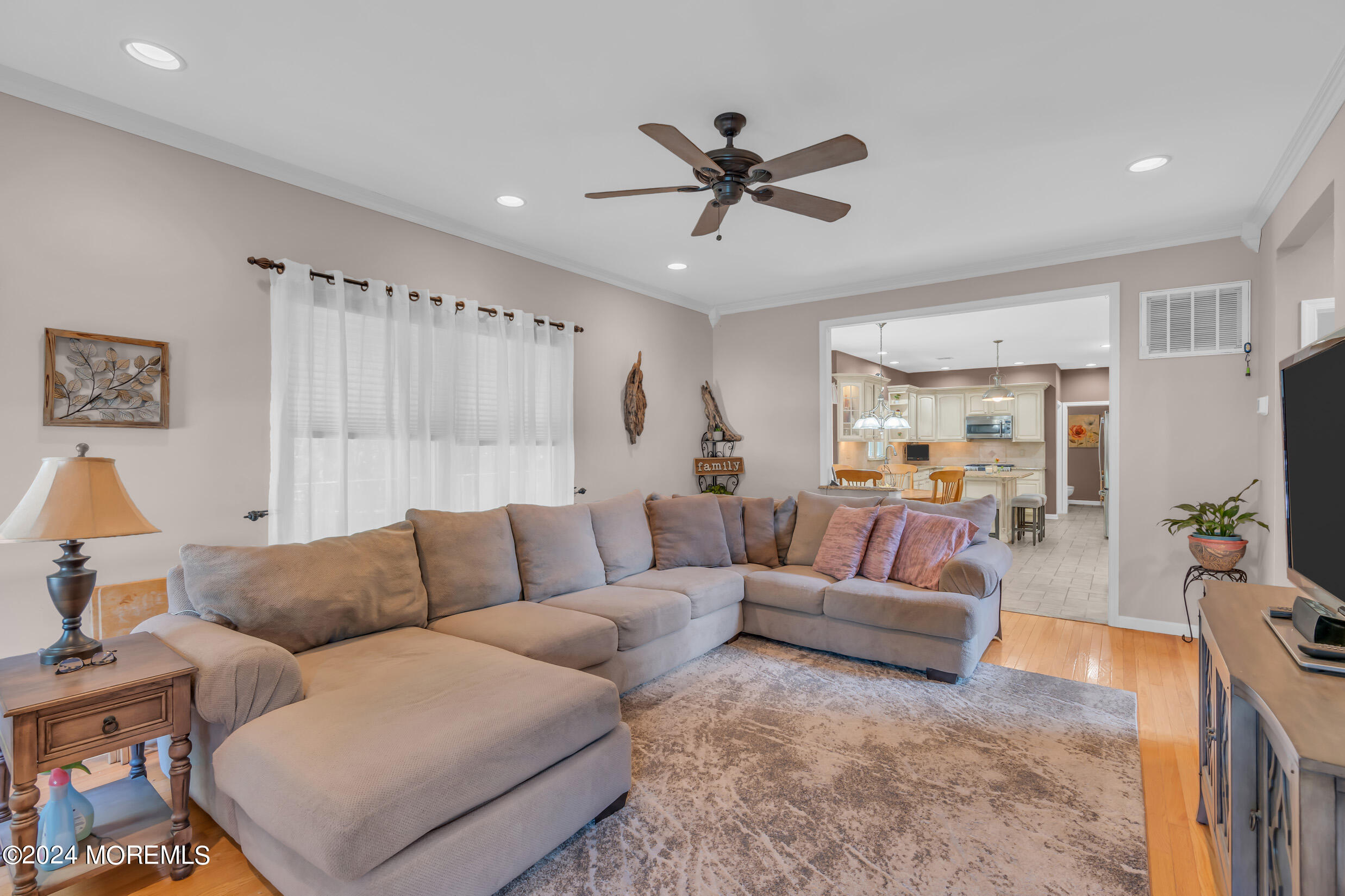 24 Ryjac Court Brick, NJ 08724 - Photo 24 of 57 a living room with furniture and a large window